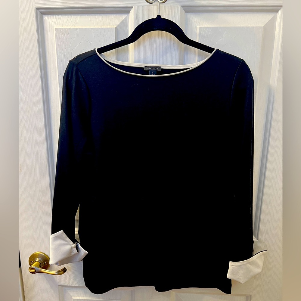 Ann Taylor 3/4 sleeve black top with white buttoned cuff, size medium